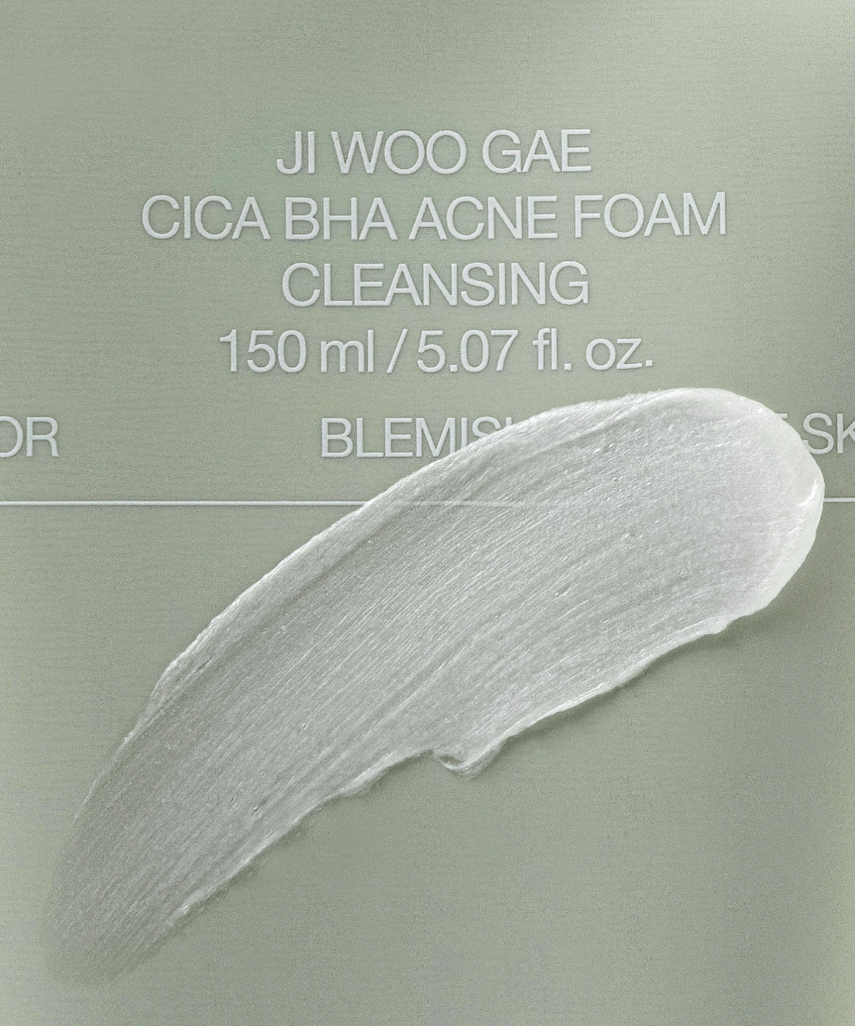 CELIMAX Ji Woo Gae Cica BHA Acne Cleansing Foam 150ml label close-up with a white cleanser smear