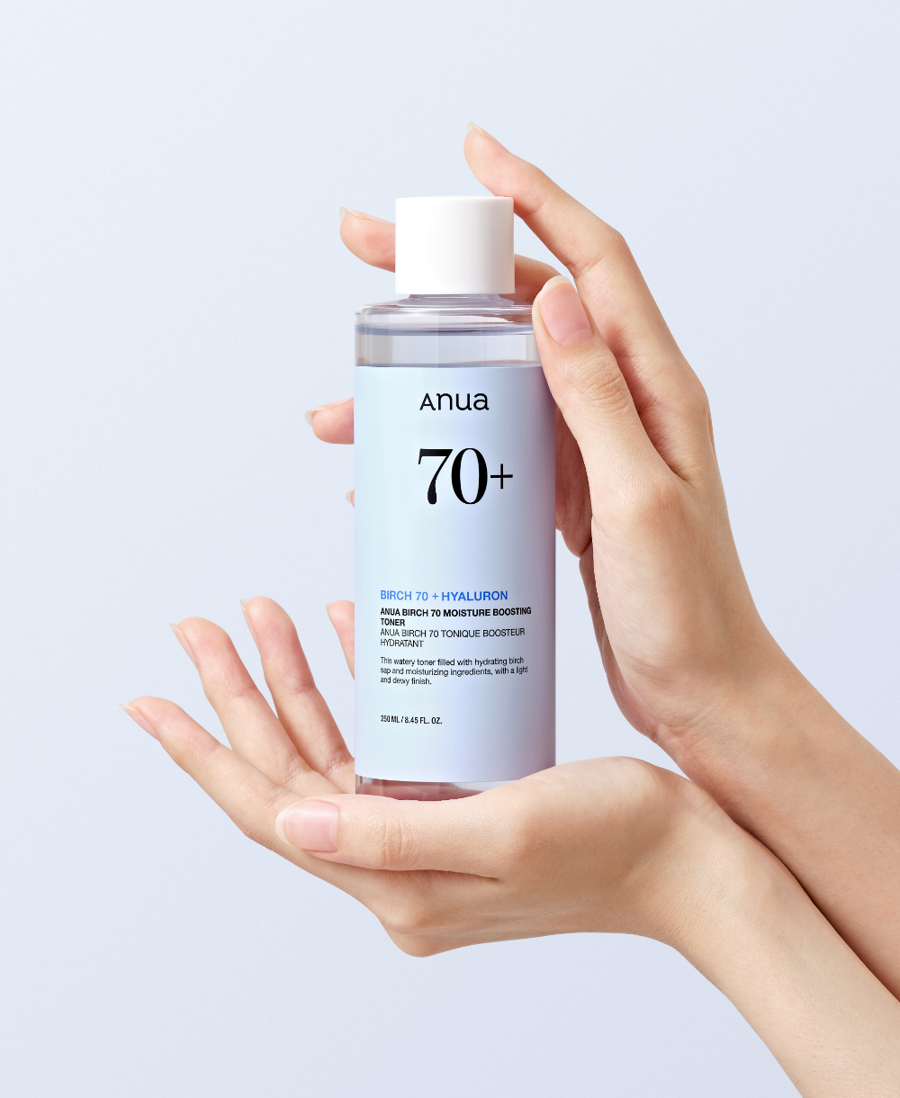 ANUA Birch 70+ Hyaluron Moisture Boosting Toner 250ml bottle held in two hands