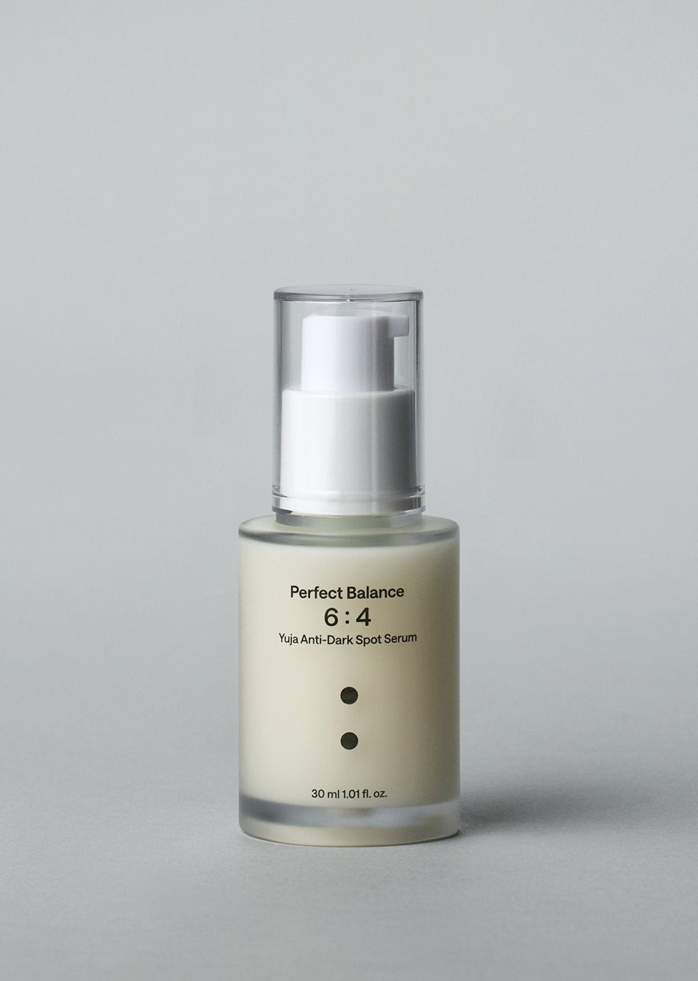 B: Lab Yuja Anti-Dark Spot Serum 30 ml pump bottle with a clear cap